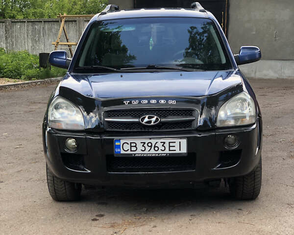 Синий Хендай Туксон, объемом двигателя 1.99 л и пробегом 315 тыс. км за 6700 $, фото 2 на Automoto.ua