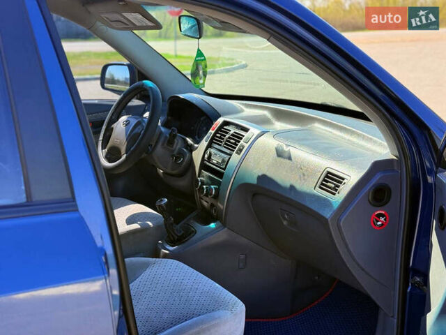 Синий Хендай Туксон, объемом двигателя 2 л и пробегом 320 тыс. км за 6300 $, фото 17 на Automoto.ua