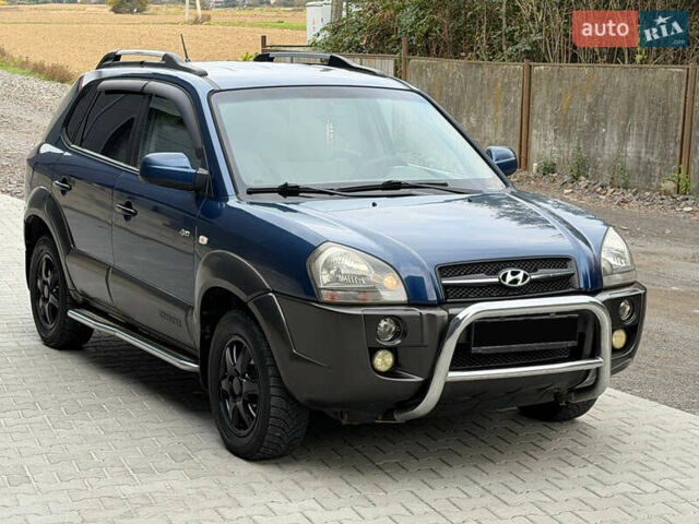 Синий Хендай Туксон, объемом двигателя 2.66 л и пробегом 320 тыс. км за 6300 $, фото 3 на Automoto.ua