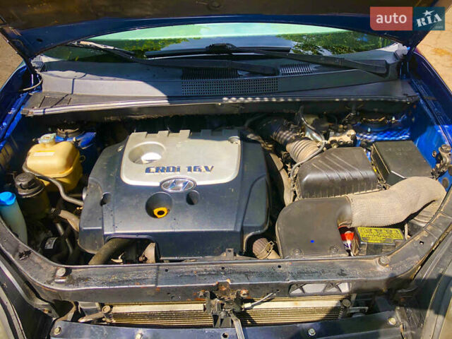 Синий Хендай Туксон, объемом двигателя 2 л и пробегом 320 тыс. км за 6300 $, фото 13 на Automoto.ua