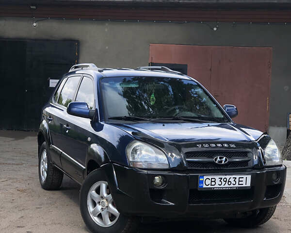 Синий Хендай Туксон, объемом двигателя 1.99 л и пробегом 315 тыс. км за 6700 $, фото 1 на Automoto.ua