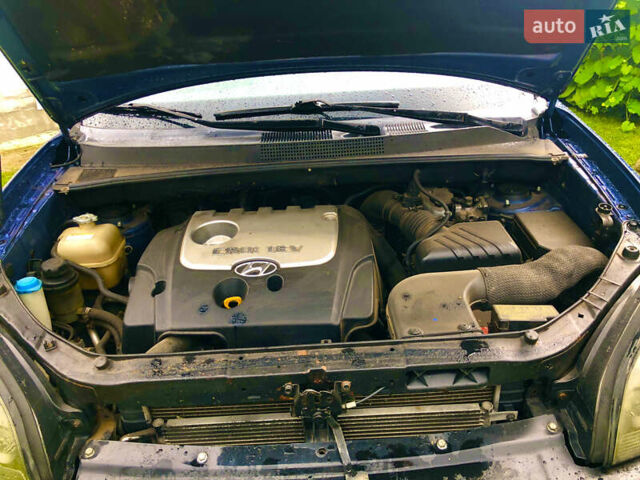 Синий Хендай Туксон, объемом двигателя 2 л и пробегом 320 тыс. км за 6300 $, фото 12 на Automoto.ua