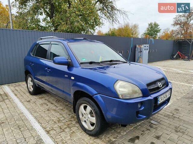 Синий Хендай Туксон, объемом двигателя 1.99 л и пробегом 225 тыс. км за 8000 $, фото 8 на Automoto.ua