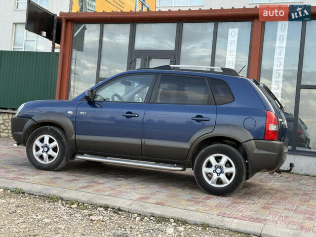 Синій Хендай Туксон, об'ємом двигуна 1.99 л та пробігом 299 тис. км за 7200 $, фото 20 на Automoto.ua