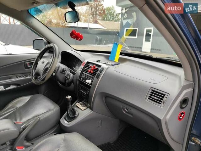 Синий Хендай Туксон, объемом двигателя 1.99 л и пробегом 225 тыс. км за 8000 $, фото 15 на Automoto.ua