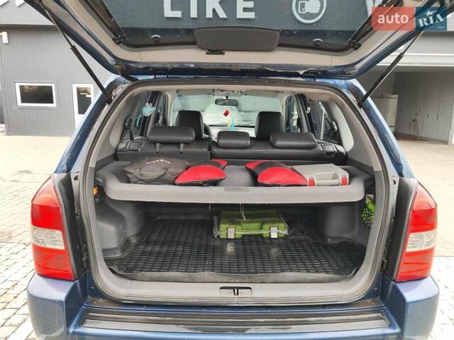 Синий Хендай Туксон, объемом двигателя 1.99 л и пробегом 225 тыс. км за 8000 $, фото 22 на Automoto.ua