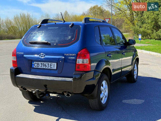 Синий Хендай Туксон, объемом двигателя 2 л и пробегом 320 тыс. км за 6300 $, фото 6 на Automoto.ua
