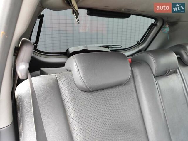 Синий Хендай Туксон, объемом двигателя 1.99 л и пробегом 225 тыс. км за 8000 $, фото 18 на Automoto.ua