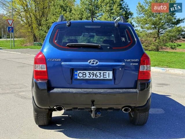 Синий Хендай Туксон, объемом двигателя 2 л и пробегом 320 тыс. км за 6300 $, фото 7 на Automoto.ua