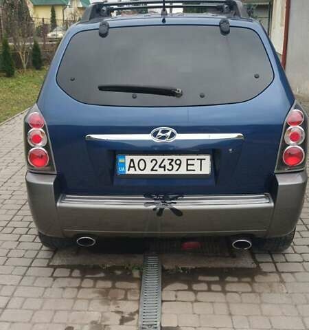 Синий Хендай Туксон, объемом двигателя 2.66 л и пробегом 320 тыс. км за 5500 $, фото 5 на Automoto.ua