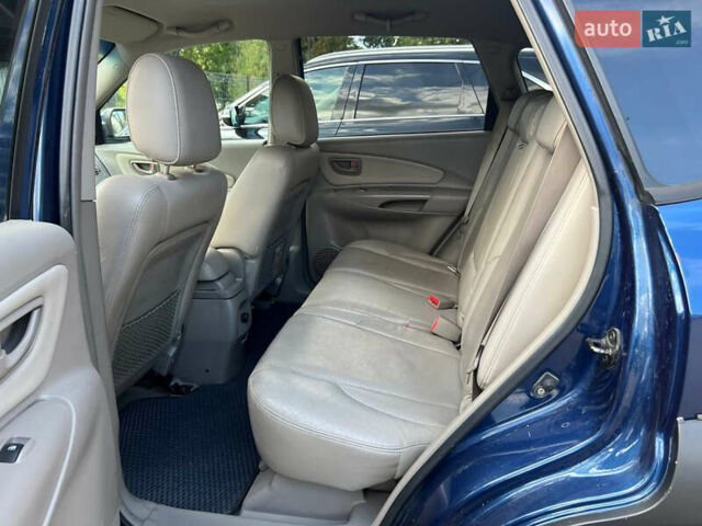 Синій Хендай Туксон, об'ємом двигуна 2 л та пробігом 245 тис. км за 6800 $, фото 10 на Automoto.ua