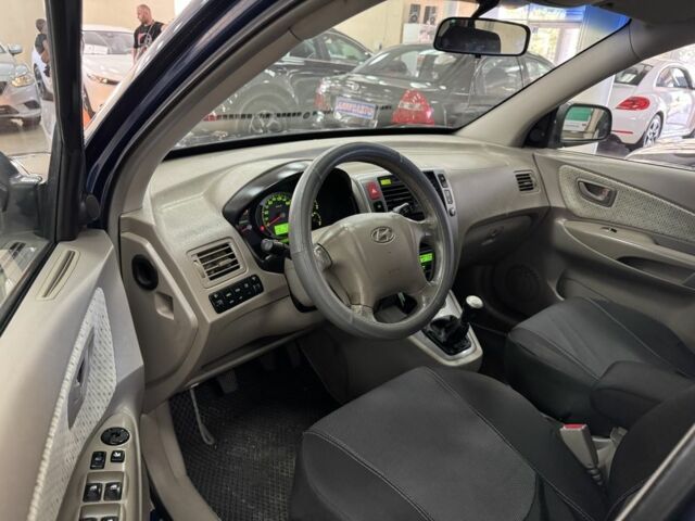 Синій Хендай Туксон, об'ємом двигуна 2 л та пробігом 170 тис. км за 7700 $, фото 9 на Automoto.ua