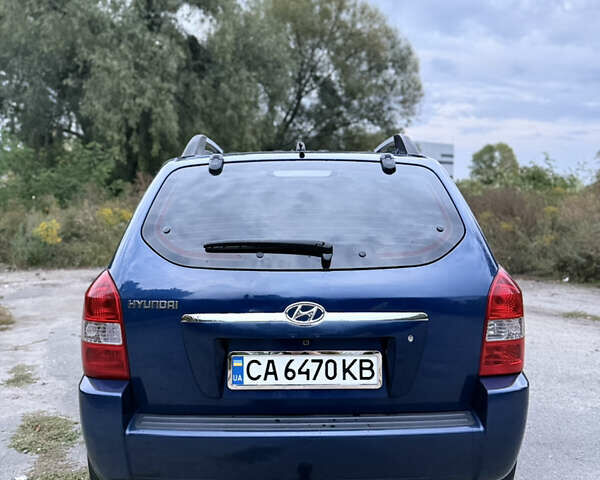 Синий Хендай Туксон, объемом двигателя 2 л и пробегом 202 тыс. км за 6100 $, фото 5 на Automoto.ua