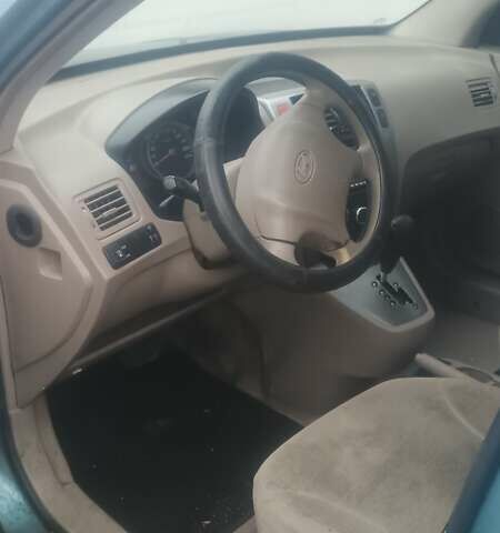 Синій Хендай Туксон, об'ємом двигуна 1.98 л та пробігом 230 тис. км за 4500 $, фото 3 на Automoto.ua