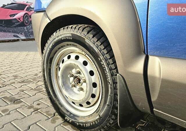 Синий Хендай Туксон, объемом двигателя 1.99 л и пробегом 313 тыс. км за 6000 $, фото 11 на Automoto.ua