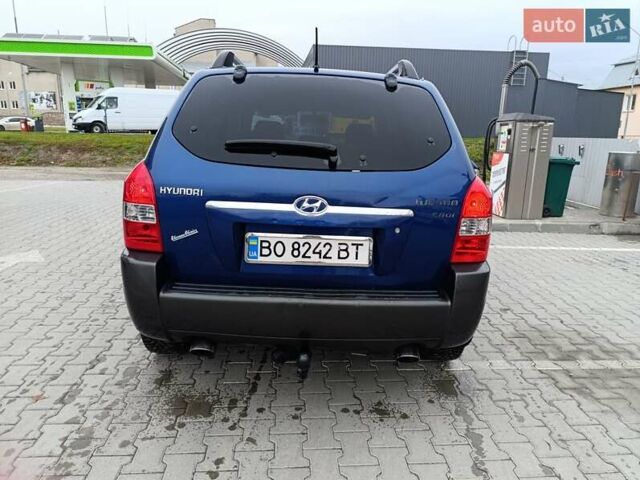 Синий Хендай Туксон, объемом двигателя 2 л и пробегом 314 тыс. км за 6700 $, фото 5 на Automoto.ua