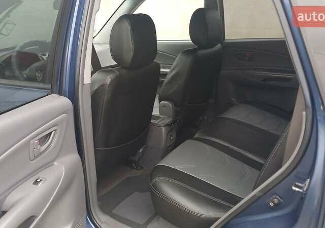 Синий Хендай Туксон, объемом двигателя 2.66 л и пробегом 320 тыс. км за 5500 $, фото 9 на Automoto.ua