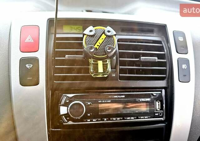 Синий Хендай Туксон, объемом двигателя 1.99 л и пробегом 313 тыс. км за 6000 $, фото 15 на Automoto.ua