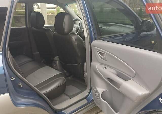 Синий Хендай Туксон, объемом двигателя 2.66 л и пробегом 320 тыс. км за 5500 $, фото 12 на Automoto.ua