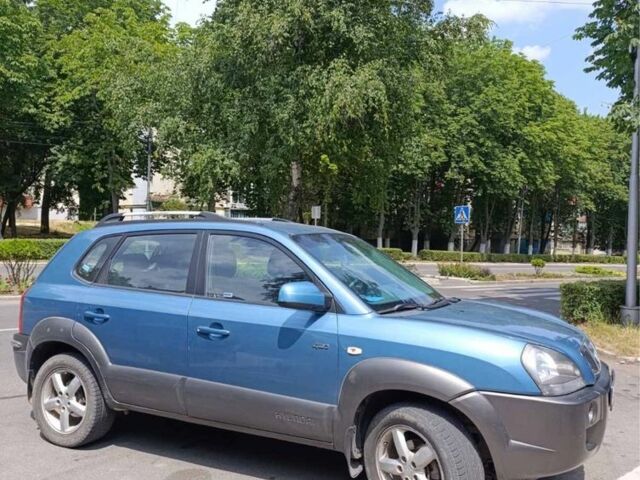 Синій Хендай Туксон, об'ємом двигуна 2 л та пробігом 215 тис. км за 7200 $, фото 2 на Automoto.ua
