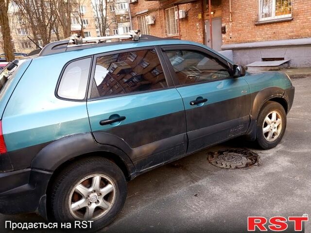 Синій Хендай Туксон, об'ємом двигуна 2 л та пробігом 273 тис. км за 4500 $, фото 2 на Automoto.ua