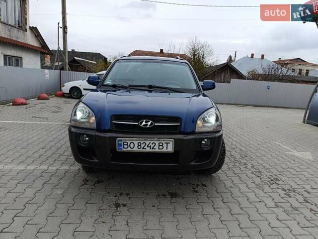 Синий Хендай Туксон, объемом двигателя 2 л и пробегом 314 тыс. км за 6700 $, фото 6 на Automoto.ua