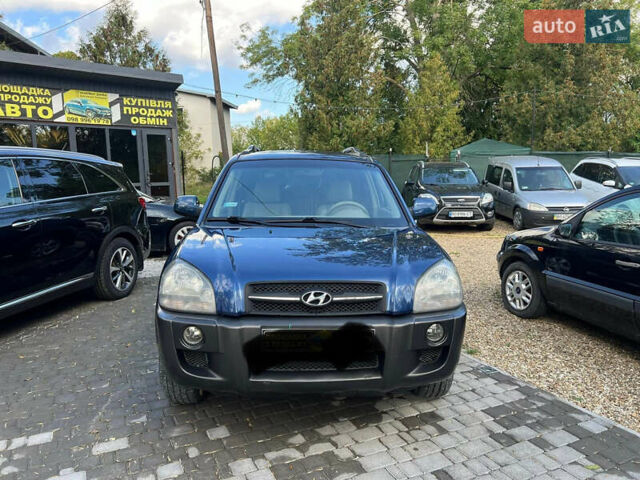 Синій Хендай Туксон, об'ємом двигуна 2 л та пробігом 245 тис. км за 6800 $, фото 1 на Automoto.ua