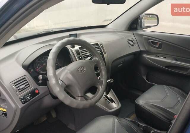 Синий Хендай Туксон, объемом двигателя 2.66 л и пробегом 320 тыс. км за 5500 $, фото 6 на Automoto.ua