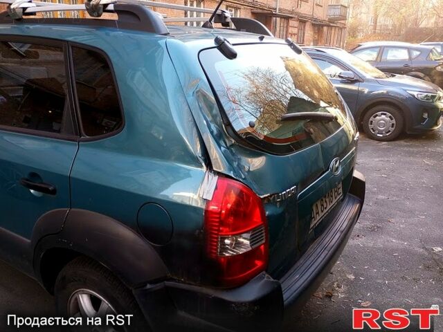 Синій Хендай Туксон, об'ємом двигуна 2 л та пробігом 273 тис. км за 4500 $, фото 1 на Automoto.ua