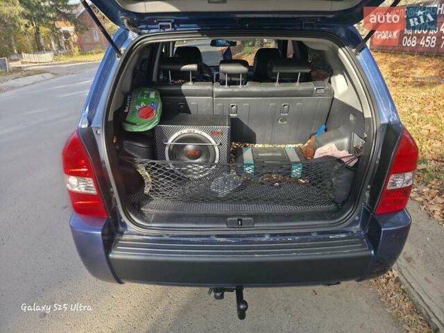 Синий Хендай Туксон, объемом двигателя 1.98 л и пробегом 187 тыс. км за 8400 $, фото 5 на Automoto.ua