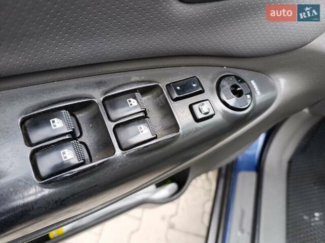 Синий Хендай Туксон, объемом двигателя 2 л и пробегом 314 тыс. км за 6700 $, фото 11 на Automoto.ua