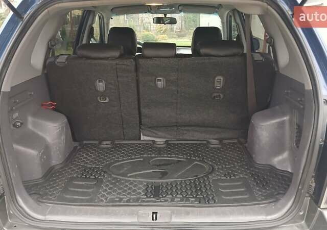 Синий Хендай Туксон, объемом двигателя 2.66 л и пробегом 320 тыс. км за 5500 $, фото 10 на Automoto.ua