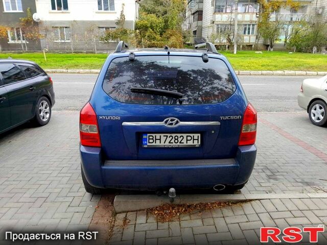 Синій Хендай Туксон, об'ємом двигуна 2 л та пробігом 205 тис. км за 7700 $, фото 2 на Automoto.ua