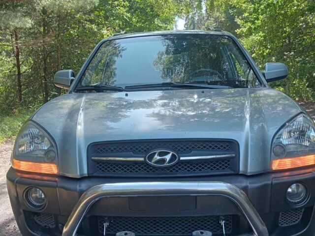 Синій Хендай Туксон, об'ємом двигуна 2 л та пробігом 288 тис. км за 7600 $, фото 3 на Automoto.ua