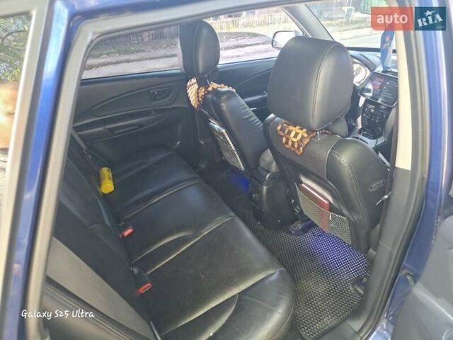 Синий Хендай Туксон, объемом двигателя 1.98 л и пробегом 187 тыс. км за 8400 $, фото 13 на Automoto.ua