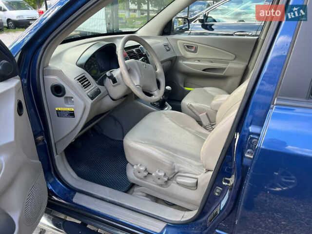 Синій Хендай Туксон, об'ємом двигуна 2 л та пробігом 245 тис. км за 6800 $, фото 8 на Automoto.ua