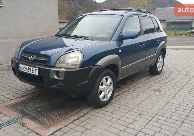 Синий Хендай Туксон, объемом двигателя 2.66 л и пробегом 320 тыс. км за 5500 $, фото 1 на Automoto.ua