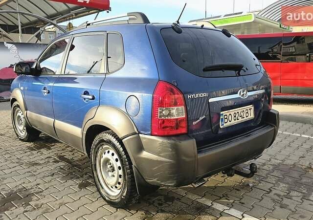 Синий Хендай Туксон, объемом двигателя 1.99 л и пробегом 313 тыс. км за 6000 $, фото 9 на Automoto.ua