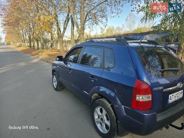 Синий Хендай Туксон, объемом двигателя 1.98 л и пробегом 187 тыс. км за 8400 $, фото 6 на Automoto.ua
