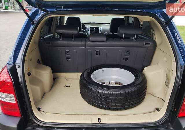 Синій Хендай Туксон, об'ємом двигуна 2 л та пробігом 225 тис. км за 7950 $, фото 16 на Automoto.ua