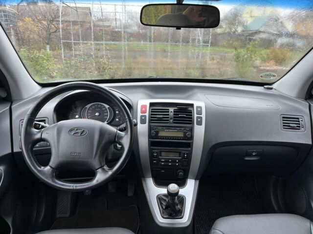 Синий Хендай Туксон, объемом двигателя 2 л и пробегом 135 тыс. км за 7450 $, фото 7 на Automoto.ua