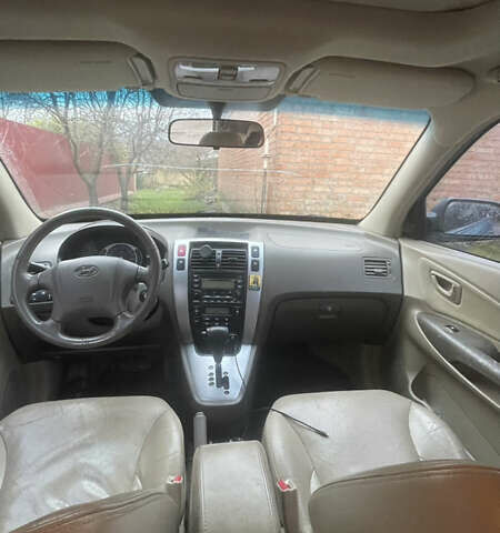 Синий Хендай Туксон, объемом двигателя 1.98 л и пробегом 277 тыс. км за 7500 $, фото 1 на Automoto.ua