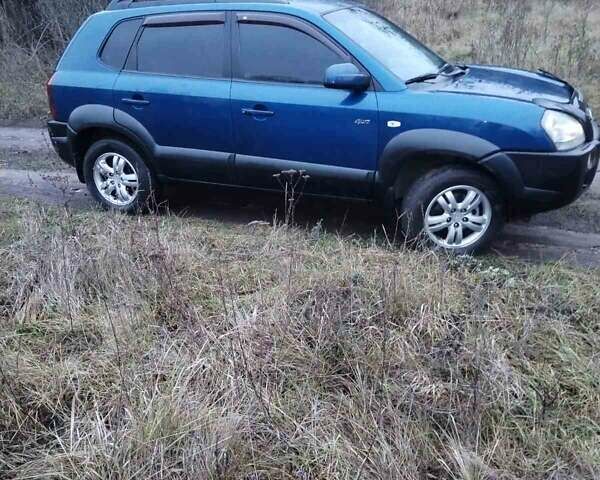 Синій Хендай Туксон, об'ємом двигуна 1.98 л та пробігом 217 тис. км за 8000 $, фото 3 на Automoto.ua