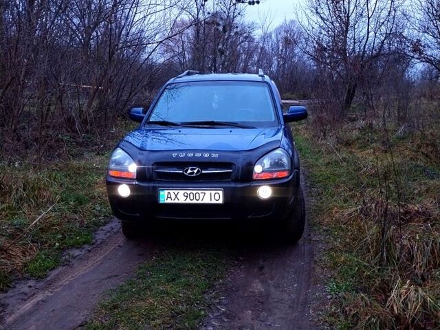 Синий Хендай Туксон, объемом двигателя 2 л и пробегом 219 тыс. км за 8400 $, фото 6 на Automoto.ua