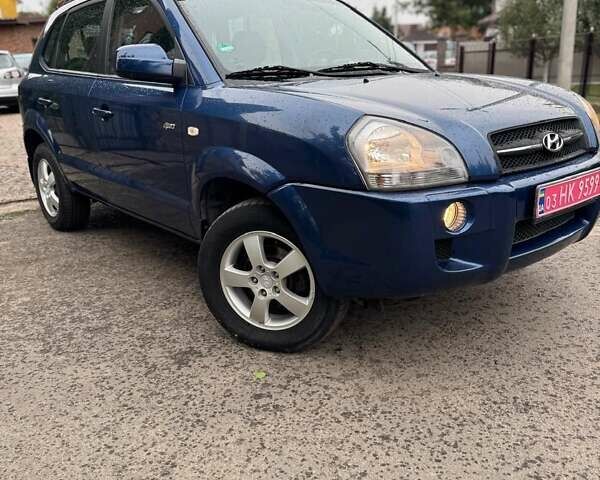Синій Хендай Туксон, об'ємом двигуна 1.98 л та пробігом 139 тис. км за 7690 $, фото 1 на Automoto.ua