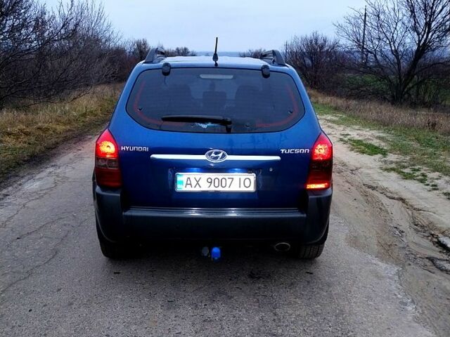 Синий Хендай Туксон, объемом двигателя 2 л и пробегом 219 тыс. км за 8400 $, фото 1 на Automoto.ua