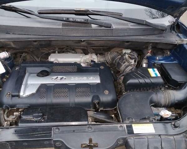 Синій Хендай Туксон, об'ємом двигуна 1.98 л та пробігом 217 тис. км за 8000 $, фото 19 на Automoto.ua