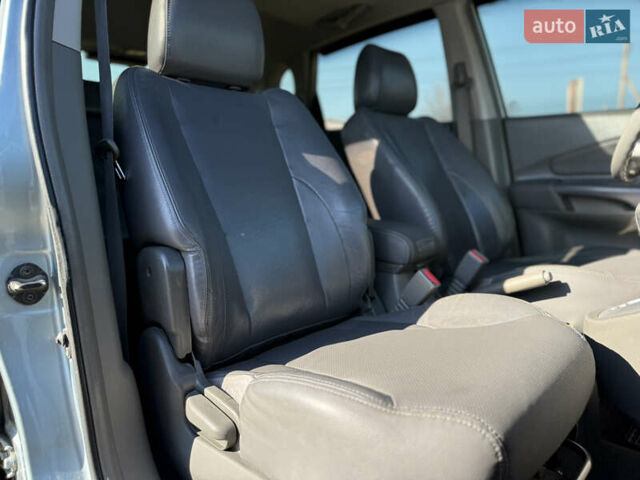 Синій Хендай Туксон, об'ємом двигуна 2 л та пробігом 317 тис. км за 6990 $, фото 11 на Automoto.ua