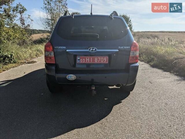 Синий Хендай Туксон, объемом двигателя 2 л и пробегом 195 тыс. км за 7200 $, фото 12 на Automoto.ua