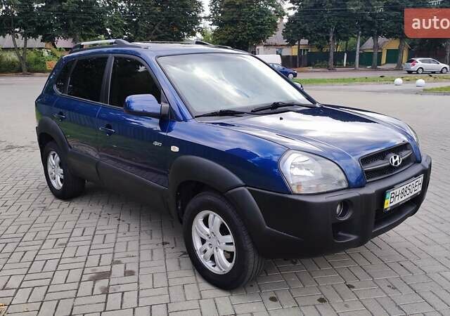Синій Хендай Туксон, об'ємом двигуна 2 л та пробігом 225 тис. км за 7950 $, фото 2 на Automoto.ua